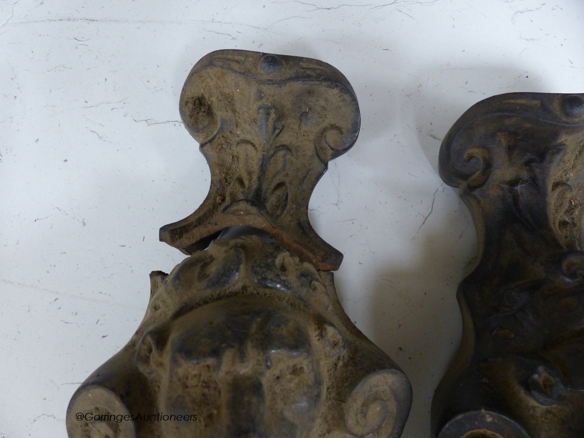 A pair of cast iron ‘lion’ monopodia mounts, 52cm high